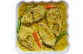 Sorshe Illish or Hilsa fish cooking with mustard seed.famous Bengali food Royalty Free Stock Photo