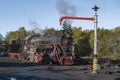 Water filling station and old soviet `L` series steam locomotive Royalty Free Stock Photo