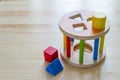 Sorter toy on wood background