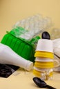 Sorting garbage. Plastic waste for recycling. Plastic bottles, containers, baking soda, forks, spoons, egg packaging, caps. Yellow