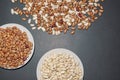 Sorting. Mixture of white and brown beans on black table. Sorting concept. Copy space Royalty Free Stock Photo