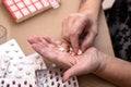 Elderly Hands Sorting Pills