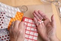 Elderly Hands Sorting Pills