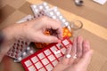 Elderly Hands Sorting Pills