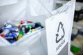 Sorting recyclables. The sorted aerosol aluminum cans, is placed in a container with the appropriate marking