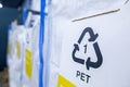 Sorting recyclables. The sorted polyethylene terephthalate PET plastic, is placed in a container with the appropriate marking Royalty Free Stock Photo