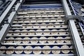 Sorting of round dietary loaves on the conveyor automated machine.