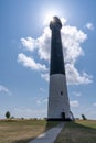 Sorve, Estonia, 07.18.2021 - Estonia, Saaremaa Island. A white lighthouse rises high above the ground on the shore of the Sorve