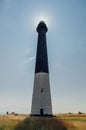 Sorve lighthouse against sun, Estonia