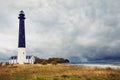 Sorve lighthouse in south Saaremaa, Estonia. Romantic lighthouse and cloudy sky in the coast of Baltic sea