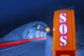 SOS sign in front of highway tunnel Royalty Free Stock Photo