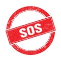 SOS text on red grungy round stamp Royalty Free Stock Photo