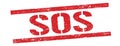 SOS text on red vintage lines stamp Royalty Free Stock Photo