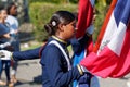 Sosua, Dominican Republic, 27 February 2020: Independence Day: Celebrations on 27th February. Girls carry the national flag