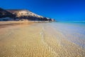 Sotavento sandy beach with vulcanic mountains in the background, Jandia, Fuerteventura, Canary Islands, Spain Royalty Free Stock Photo