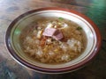 a bowl of meat soup called soto daging