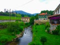 Soto river through small village in middle of the field. Paladin