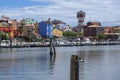 Sottomarina, ITALY - June 10, 2022: Pictoresque streets of old town Sottomarina, colorful buldings, blue house, and reservoir