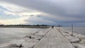 Sottomarina`s dam under cloudy sky 2