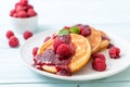 pancake with fresh raspberries and raspberry sauce Royalty Free Stock Photo