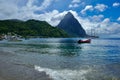 Soufriere Harbor in Saint Lucia with a Sailing Ship and Gros Piton in the Background