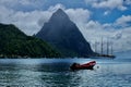 Soufriere Harbor in Saint Lucia with a Sailing Ship and Gros Piton in the Background