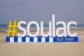 #soulac sur mer logo brand and city text sign on sandy beach france on ocean