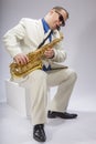 Saxophonist Caucasian soloist plays the saxophone Royalty Free Stock Photo