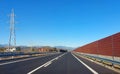 sound-absorbing noise barrier on the highway to protect against noise emissions from vehicles