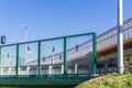 Sound absorbing screens on the highway and overpass.