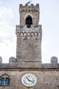 Ancient bell tower with bells and flag of the historic city Royalty Free Stock Photo