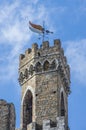 Ancient bell tower with bells and flag of the historic city Royalty Free Stock Photo