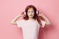 Sound audio girl cute music childhood listen children little enjoy small Royalty Free Stock Photo