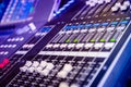 Soundboard close up in purple concert light