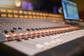 Sound board, music and production in recording studio with creativity and audio equipment. Mixing console with buttons Royalty Free Stock Photo