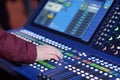 sound engineer controls live sound mixing console Royalty Free Stock Photo