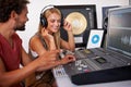 Sound engineer, DJ listening and recording studio working on music, radio and audio with tech and staff. Producer, media Royalty Free Stock Photo