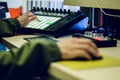 Sound engineer working at mixing panel in his sound recording studio Royalty Free Stock Photo