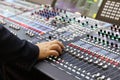 Sound engineer working in a sound mixing studio