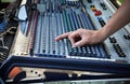 Sound engineer works with sound mixer Royalty Free Stock Photo