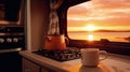 The sound of espresso brewing, a symphony of flavors to be enjoyed in the motorhome's intimate setting