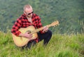 Sound of freedom. Musician hiker find inspiration in mountains. In unison with nature. Keep calm and play guitar. Man Royalty Free Stock Photo