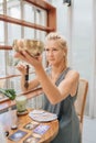 Sound Healer working with Tibetan Singing Bowl Royalty Free Stock Photo