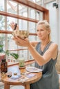 Sound Healer working with Tibetan Singing Bowl Royalty Free Stock Photo