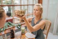 Sound Healer working with Tibetan Singing Bowl Royalty Free Stock Photo