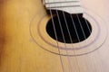 Sound hole of the guitar with the strings for the background Royalty Free Stock Photo