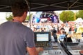 Sound and lighting engineer at an outdoor festival concert Royalty Free Stock Photo