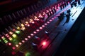 Sound mixer closeup with glowing lights at club party AI generated