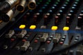 Sound mixer control panel on dark light background in audio control room Royalty Free Stock Photo