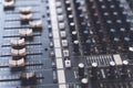 Sound mixer. Professional audio mixing console with lights, buttons, faders Royalty Free Stock Photo
